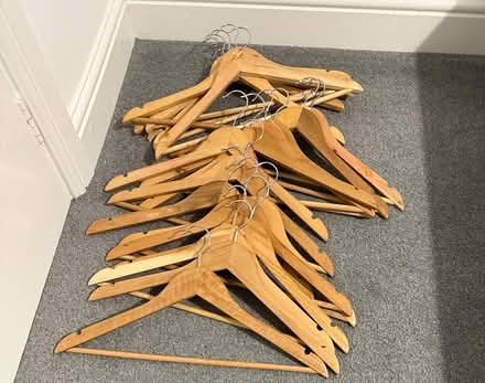 Photo of free 20 wooden coat hangers (ware SG12) #1