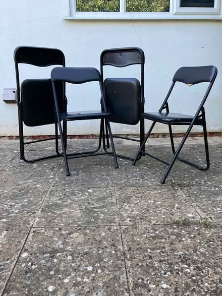 Photo of free 4 black folding chairs (Guildford, SW, GU2) #2