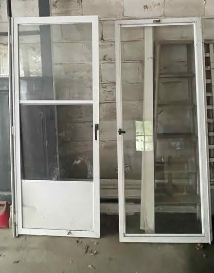 Photo of free 2 metal screen doors (Davis Sq) #1