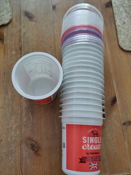 Photo of free 16 washed plastic cream pots with lids (Henleaze Ward BS9) #1