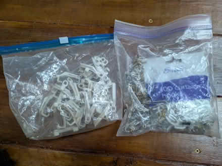 Photo of free White plastic curtain rail & hooks (Crookes S10) #1