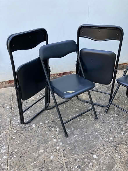 Photo of free 4 black folding chairs (Guildford, SW, GU2) #3