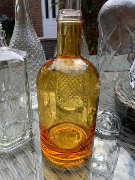 Photo of Clean empty orange or brown bottles (Ware SG12) #1