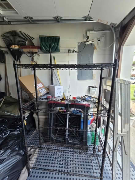 Photo of free Metal garage shelving unit (Port Monmouth) #1