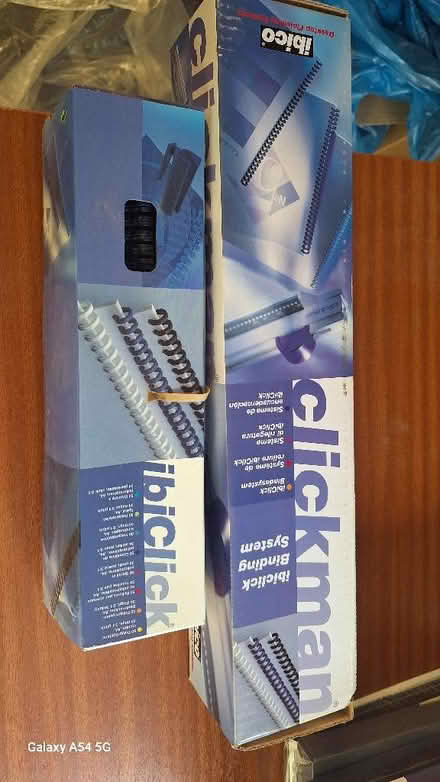 Photo of free Binding System & 14 boxes of binders. (Brampton - Appleby CA16) #1