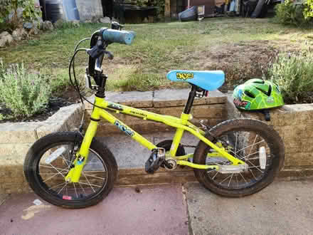 Photo of free Boys bike and Dino helmet (Frome BA11) #2