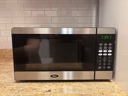 Photo of free Oster Microwave (Mission Hill) #1