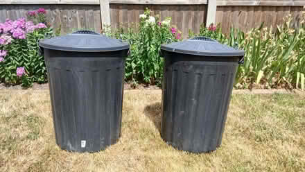 Photo of free Two black plastic dustbins with lids. (Langdon Hills SS16) #1