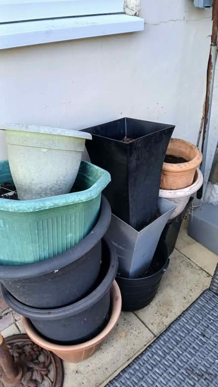 Photo of free Various sizes of pots with soil in them (Upton CH49) #1