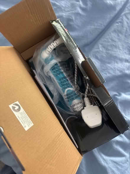 Photo of free Iron (never used) (Manchester M13) #2