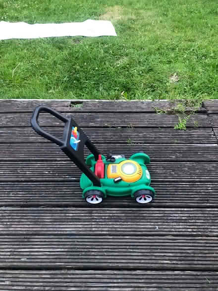 Photo of free Toy lawnmower (OL8 2XQ) #2