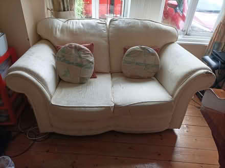 Photo of free 2 seater cream sofa (Harold's X) #1