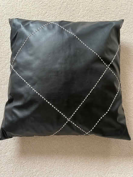 Photo of free Black fsux leather cushion. (Swindon SN3) #1