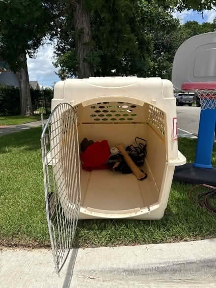 Photo of free Dog kennel for 80lbs + (Heights by Heights Boulevard) #1