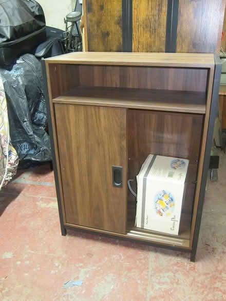 Photo of free Mid-size Sliding-Door Cabinet (Hell's Kitchen) #1
