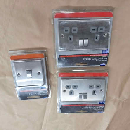 Photo of free Socket and switch fronts brushed steel (unopened) (Liss Forest GU33) #1