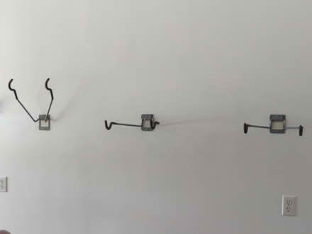 Photo of free 3 Wall-mounted bike hangers (Oswego) #1