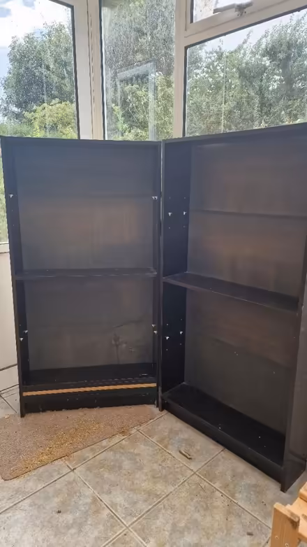 Photo of free Two black bookcases (Bluntisham PE28) #2