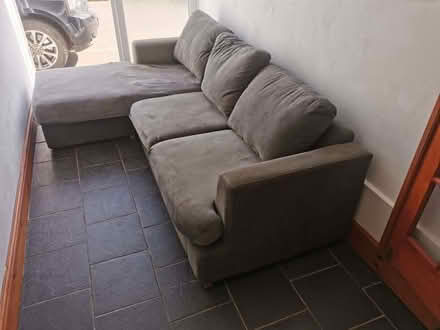 Photo of free large L shaped sofa with grey loose covers (Craven Arms SY7) #2