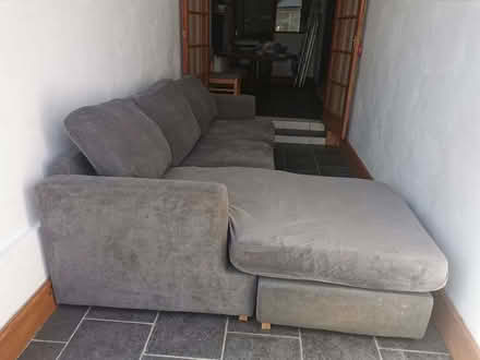 Photo of free large L shaped sofa with grey loose covers (Craven Arms SY7) #1