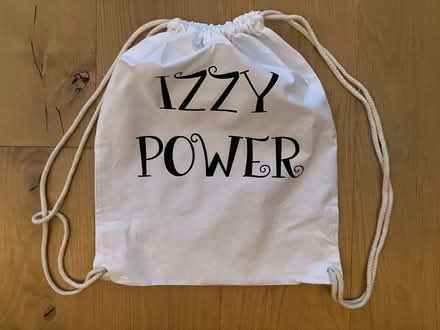 Photo of free "Izzy Power" cotton draw string bag (Roundwood AL5) #1