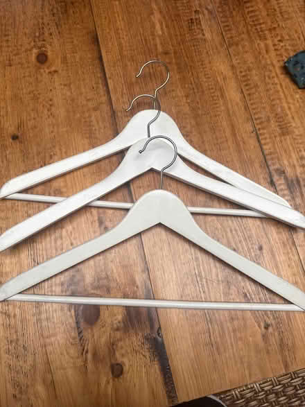 Photo of free 3 wooden white coat hangers (Wood Green N22) #1