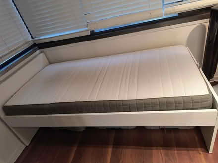 Photo of free Twin bed frame with mattress (Alberni Street) #1