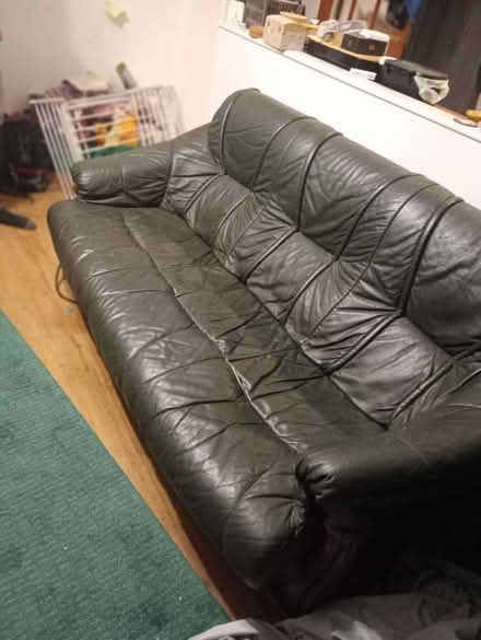 Photo of free Leather sofa with wooden base (Chorlton Manchester) #1