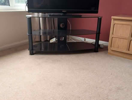 Photo of free Glass TV stand (Rothwell LS26) #1