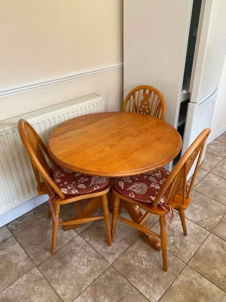 Photo of free Circular pedestal table & 4 chairs (Stockland Green B23) #1