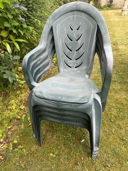 Photo of free 4 plastic garden chairs (Knotty Green HP9) #1