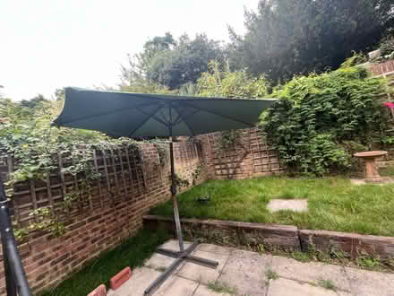 Photo of free Sun umbrella Garden Patio working (SW15) #1