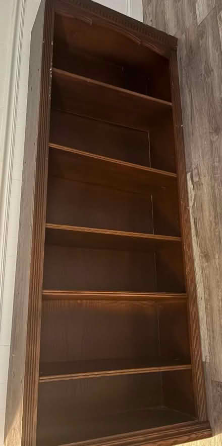 Photo of free Tall wood bookshelf (Woodbridge, va) #1