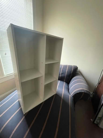 Photo of free Small shelving unit (Dupont/Logan) #1
