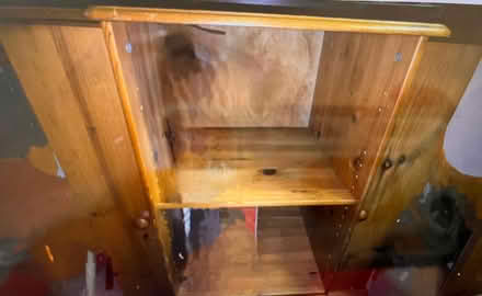Photo of free Wooden Tv stand with middle and side storage on offer (Higher Bebington CH63) #1