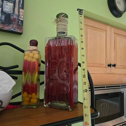 Photo of free Kitchen decorative bottles w/chilis (Columbia, Md) #1