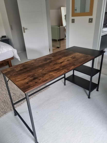 Photo of free Table with shelves..like new (EX33) #1