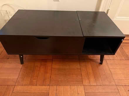 Photo of free Black table with desk feature (10025) #1