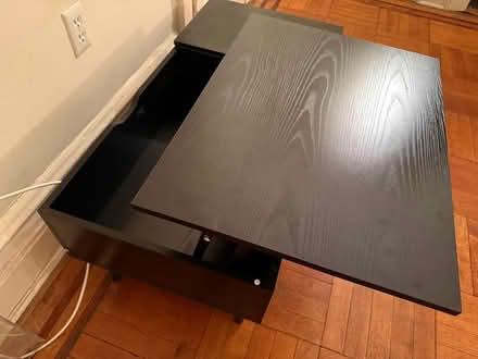 Photo of free Black table with desk feature (10025) #2