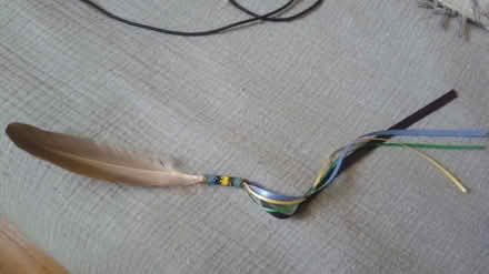 Photo of free feather with beads and strings (near Britannia Plaza) #1