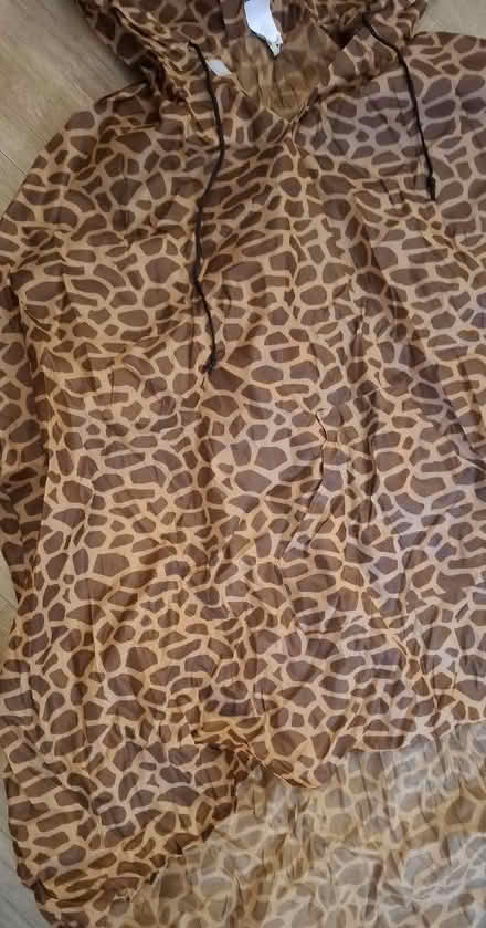 Photo of free Packable giraffe print poncho (Boughton Monchelsea ME17) #2