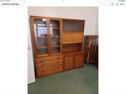 Photo of free Vintage S form wood display cabinet (Stroud) #1