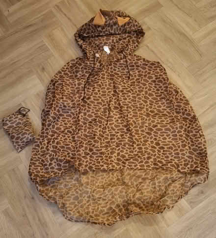 Photo of free Packable giraffe print poncho (Boughton Monchelsea ME17) #1