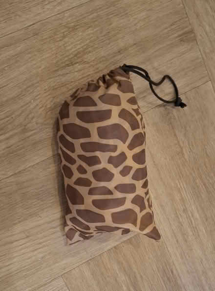 Photo of free Packable giraffe print poncho (Boughton Monchelsea ME17) #3