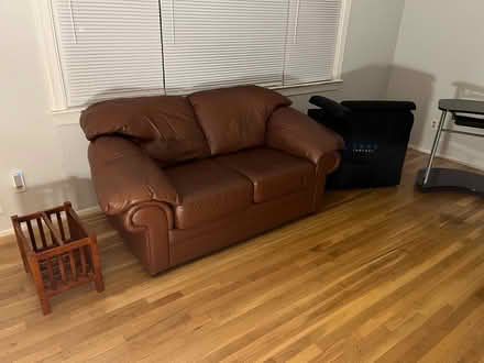 Photo of free All leather love seat (Holmdel NJ) #1