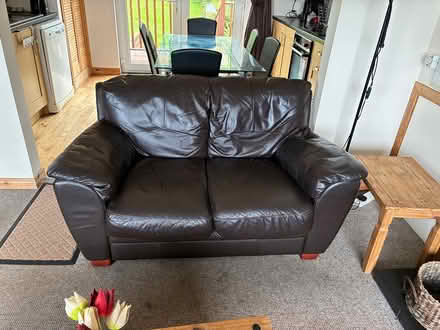 Photo of free Two seater leather sofa (Ballintoy, NI, BT54 6LZ) #1