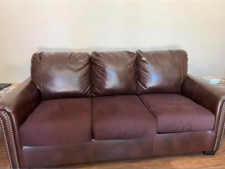 Photo of free 3 seater sofa (7-Eleven on E Evelyn Ave) #1