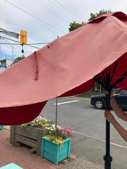 Photo of free Two sun bleached patio umbrellas (K1Y) #3