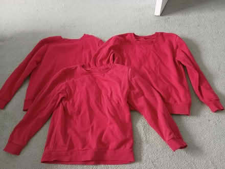Photo of free Three red sweatshirts 8-9 (CW2) #1