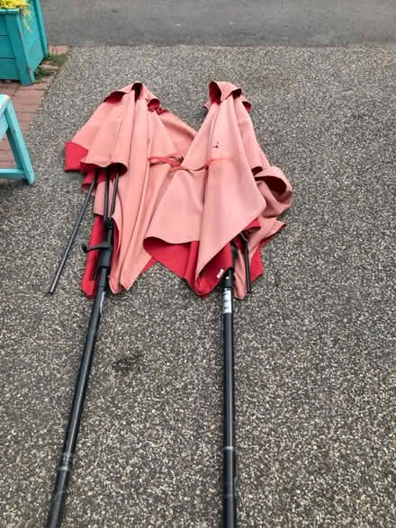 Photo of free Two sun bleached patio umbrellas (K1Y) #1